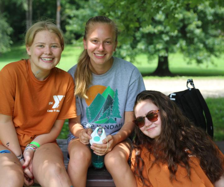 Happy Teens on a Bench